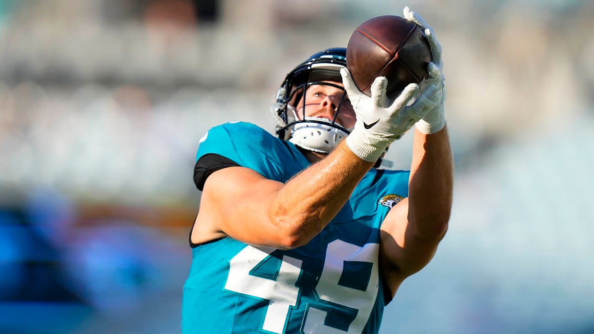 Josh Pederson warms up during a preseason game