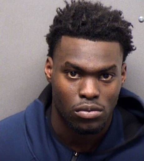 Henderson, 18 at the time, was arrested the next day on two felony gun charges, according to Dallas News, with court documents indicating one of his charges related to Possession of a Firearm on School Premises.