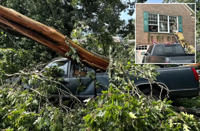 Deadly severe weather outbreak knocks out power to 1 million after hurricane-force winds wreak havoc on East