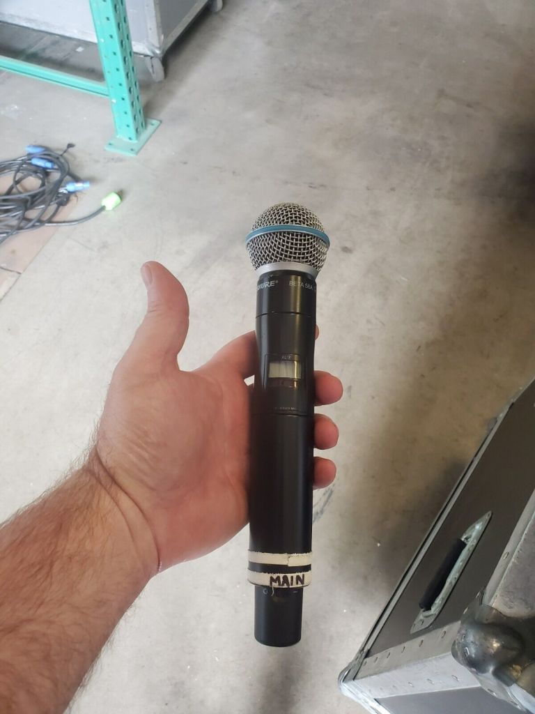 Cardi B's hurled microphone lands big bucks in charity auction