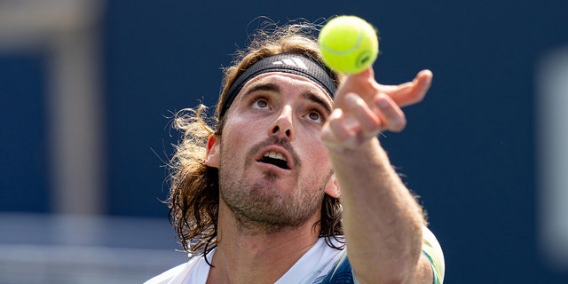 Stefanos Tsitsipas about to serve