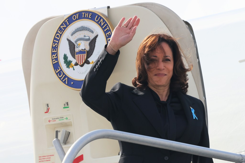 Vice President Kamala Harris waves after she prepares to depart from LaGuardia Airport after the annual 9/11 Commemoration Ceremony at the National 9/11 Memorial and Museum on September 11, 2023 