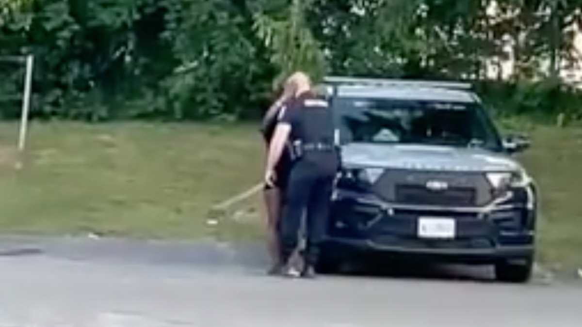 Cop kissing woman