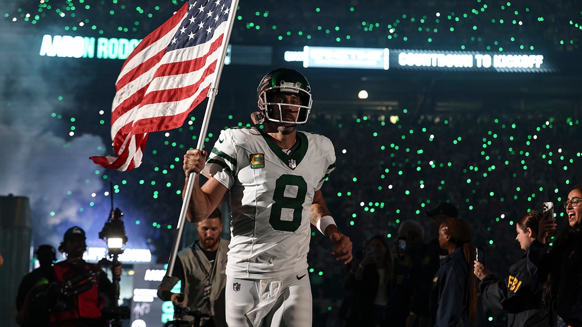 Aaron Rodgers on the field