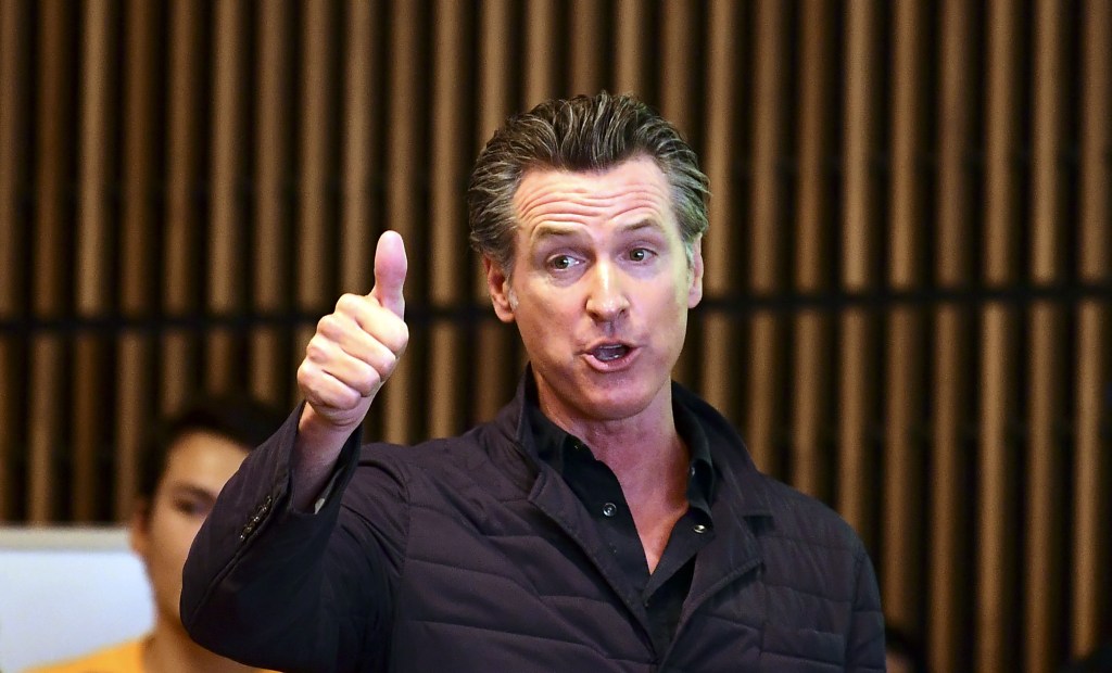 California Governor Gavin Newsom gives a thumbs up during a visit to East Los Angeles College in Monterey Park, California on Aug. 29, 2019.