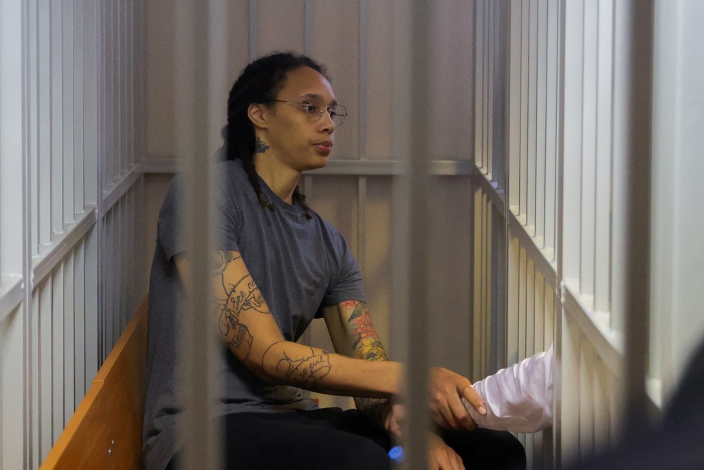 Griner, who was detained at Moscow's Sheremetyevo airport and later charged with illegal possession of cannabis, sits inside a defendants' cage after Russian courts found guilty her outside Moscow, Russia August 4, 2022.