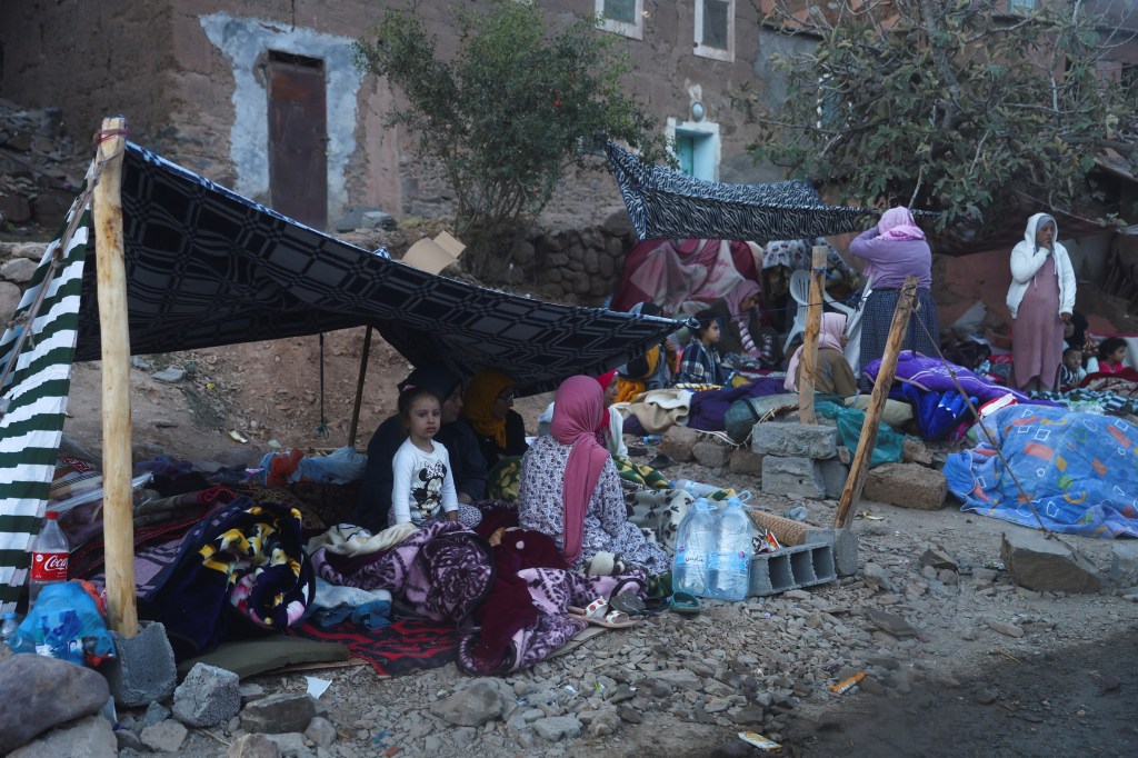 People camp on the roadside in the aftermath of the deadly earthquake in Imgdal, Morocco. 