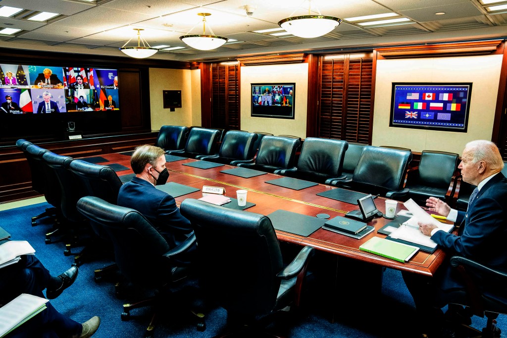 President Joe Biden meets virtually with world leaders, Friday, February 10, 2022, in the Situation Room of the White House. 