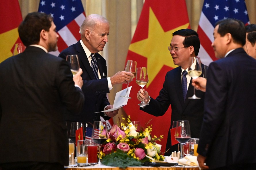 President Joe Biden makes a toast with Vietnam's President Vo Van Thuong during a State luncheon at the Presidential Palace in Hanoi on Sep. 11, 2023. 