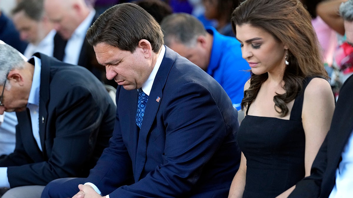 Ron and Casey DeSantis pray at Jacksonville vigil