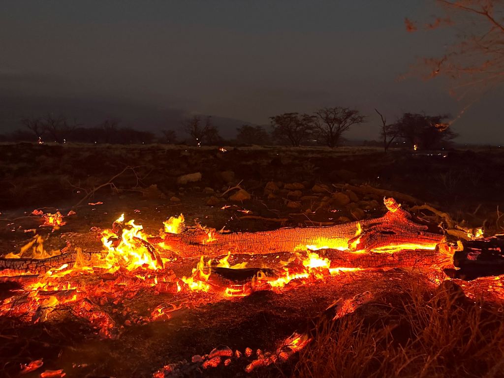 A fire is seen spreading in Kihei, Hawaii on Aug. 9, 2023 during the Maui wildfire.