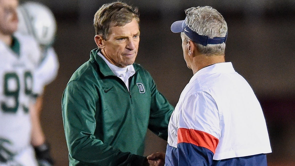 Buddy Teevens greeting coach