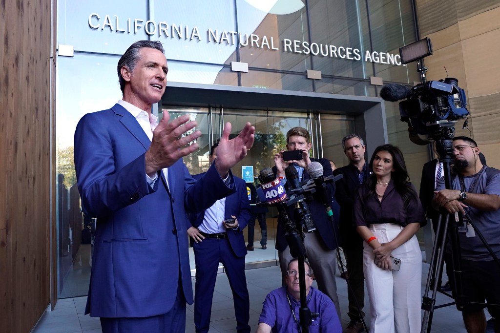 Gov. Newsom speaks to reporters outside the California Natural Resources Agency in Sacramento, Calif., on Oct. 7, 2022.