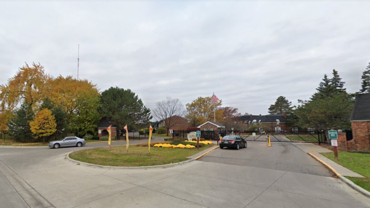 The Coach Apartments entrance on Providence Drive in Southfield, Michigan