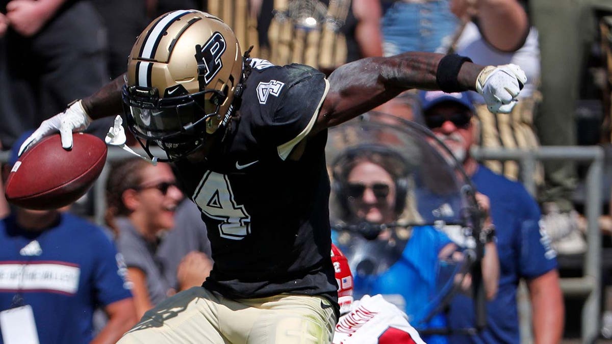 Wide receiver Deion Burks celebrates