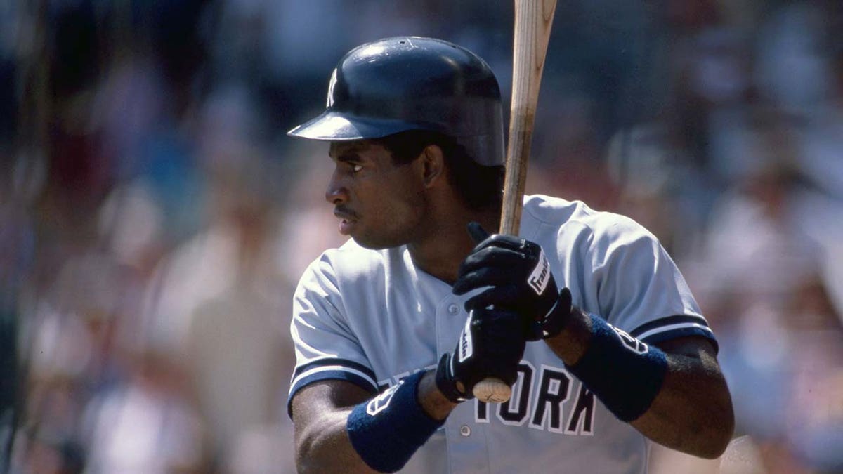 Deion Sanders bats for the New York Yankees