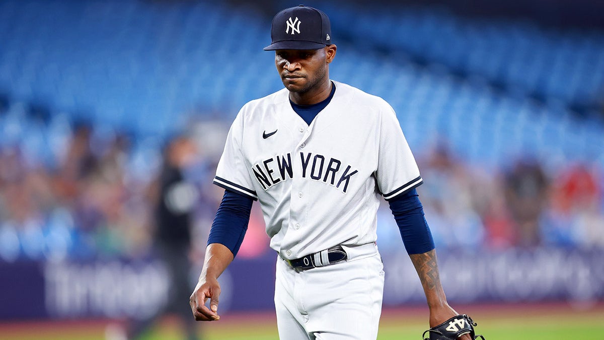 Domingo German walks off field