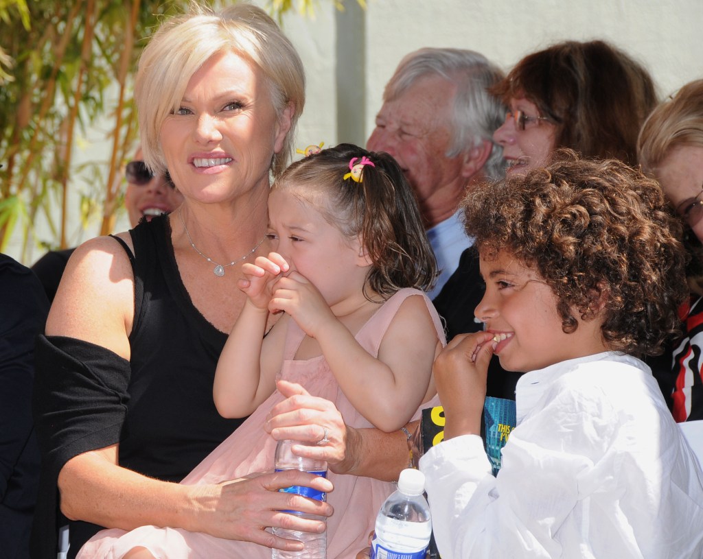 Deborra Lee Furness and children Ava and Oscar attend the handprint and footprint ceremony honoring Hugh Jackman at Grauman's Chinese Theatre on April 21, 2009 in Hollywood, California. 

