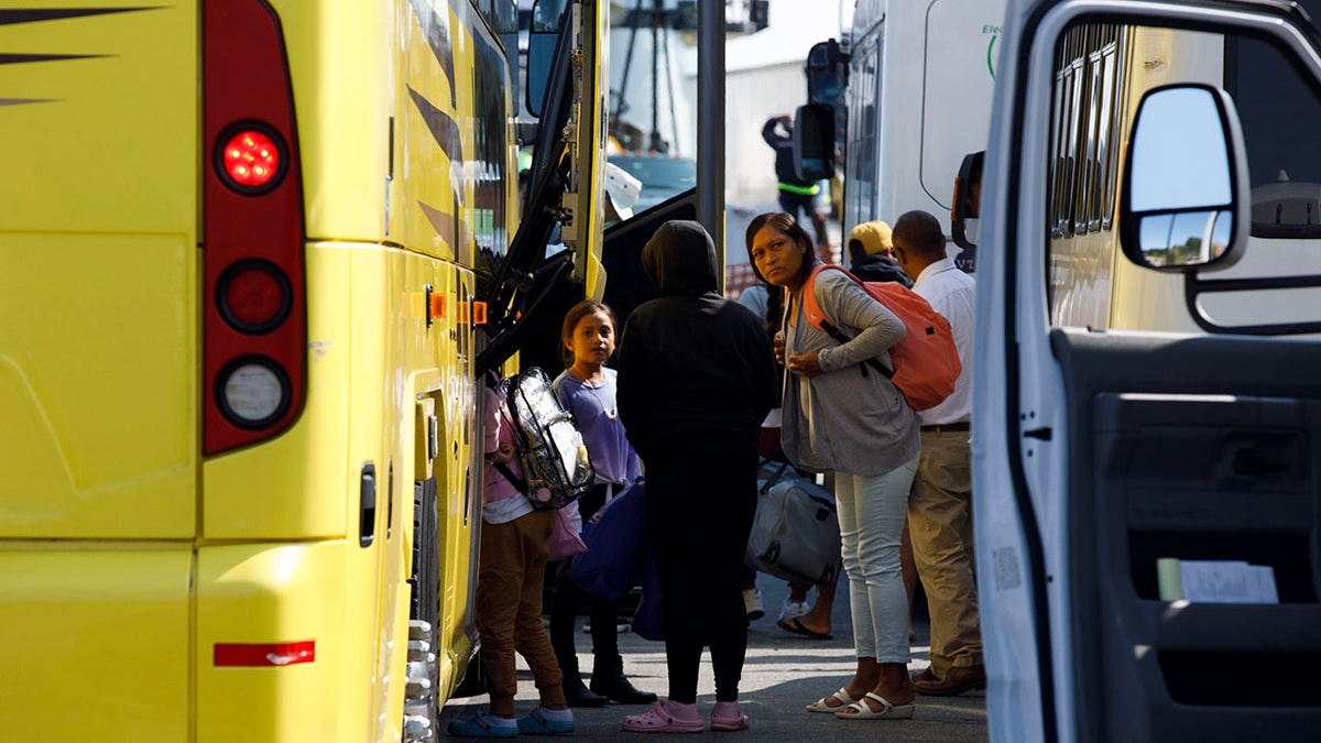 Migrants leave Martha's Vineyard for Cape Cod military base