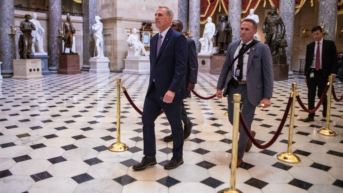 McCarthy walking in chamber