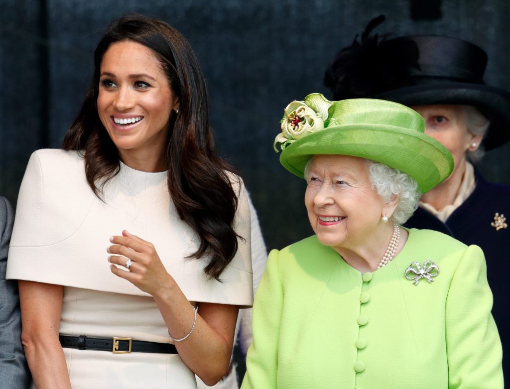 Meghan Markle pictured with the late Queen in 2018 before she and husband Prince Harry moved to North America.