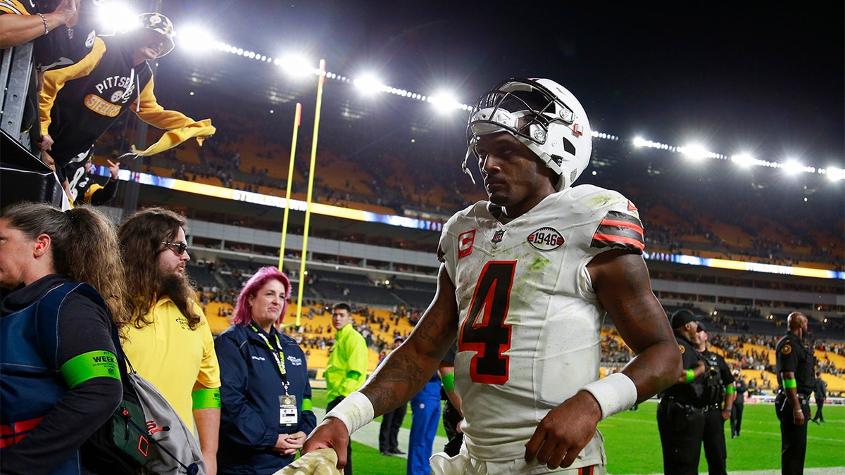 Deshaun Watson walks off the field