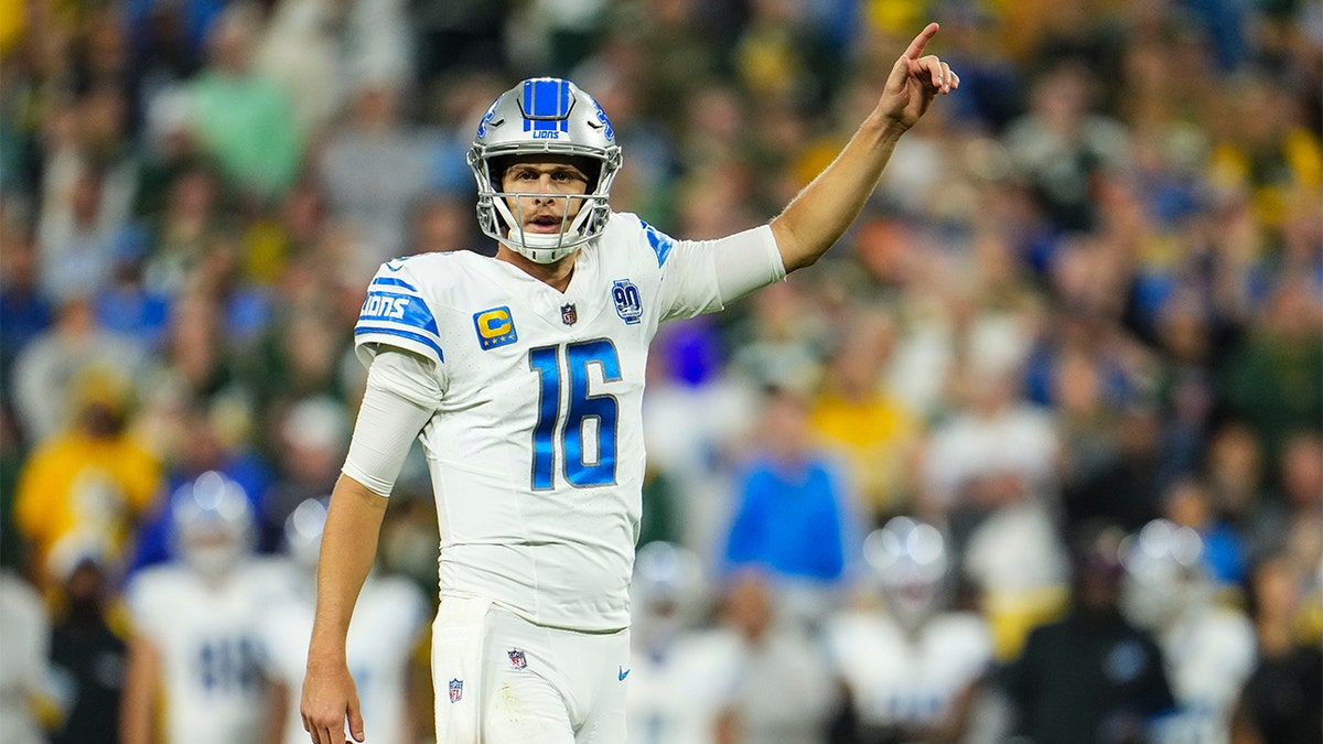 Jared Goff celebrates against the Packers