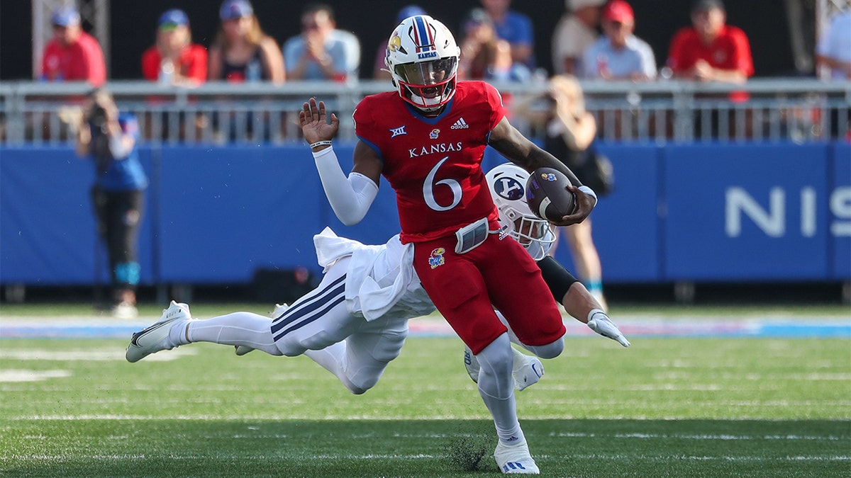 Jalon Daniels avoids a tackle