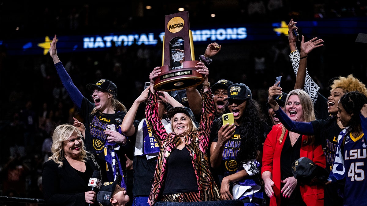 Kim Mulkey celebrates a national championship