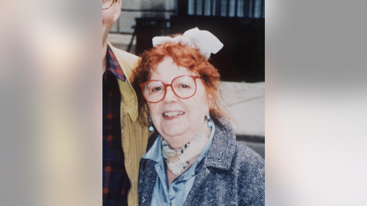 Irene Silverman wearing a denim jacket and a blue shirt