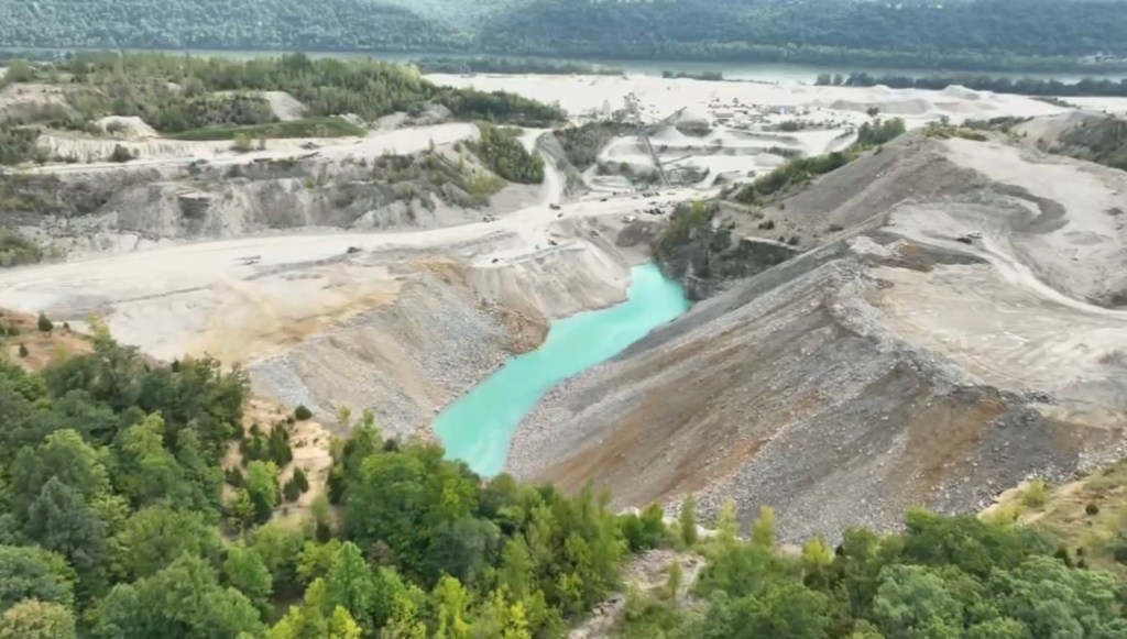 Emergency responders recovered the body of a dump truck driver, who fell several hundred feet with his vehicle into a quarry filled with water in southern Indiana.