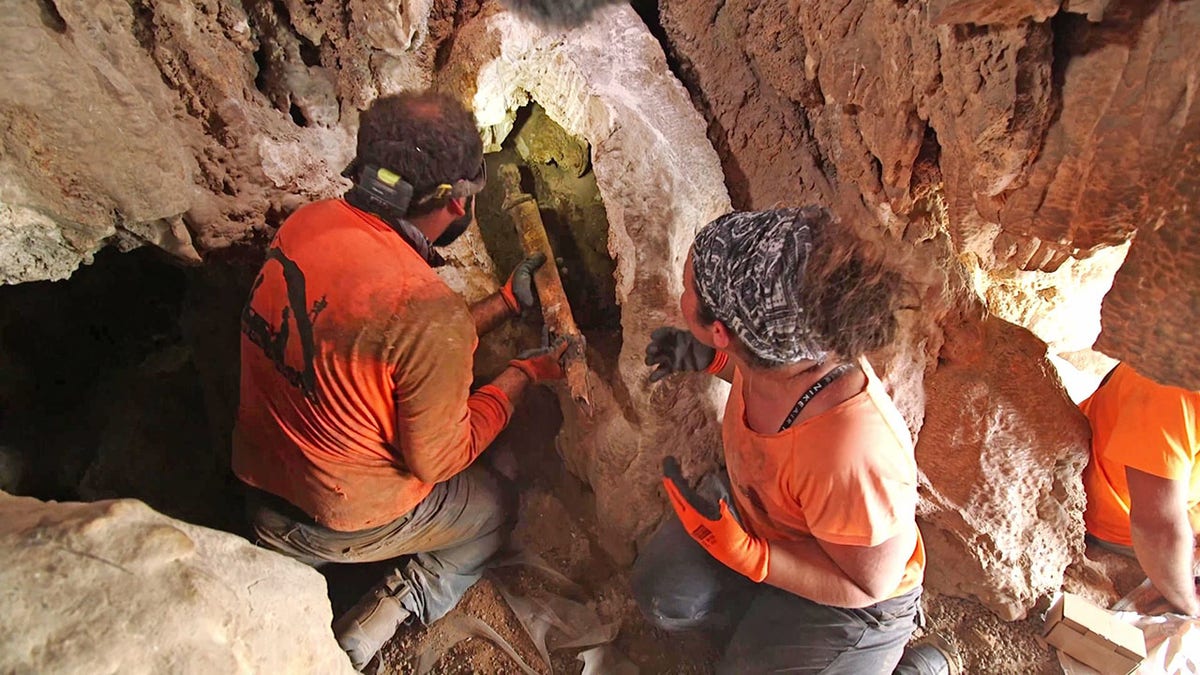 Researchers pull ancient Roman swords out of Israeli cave