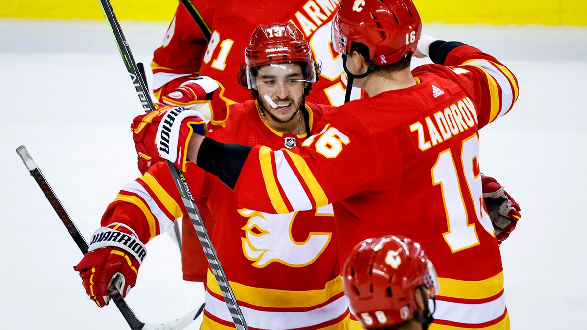 Johnny Gaudreau celebrates with teammates