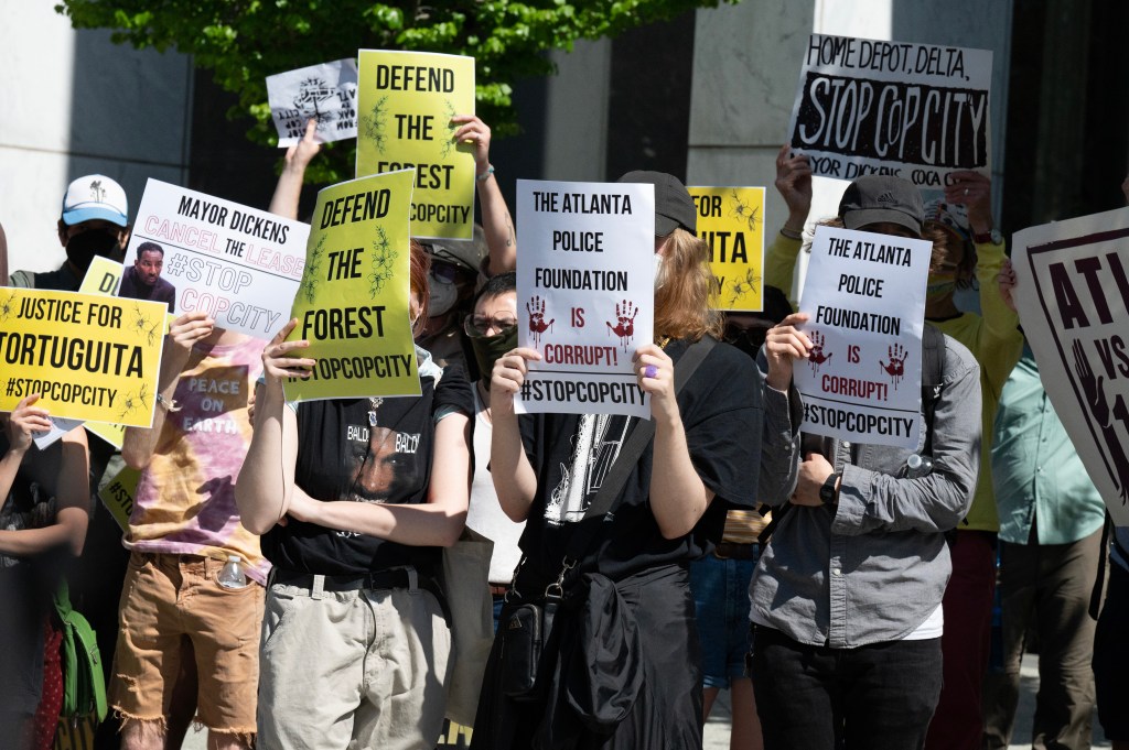 The sweeping indictment accused 61 members of a group called “Defend the Atlanta Forest” of illegally occupying the training site while committing vandalism and violence.