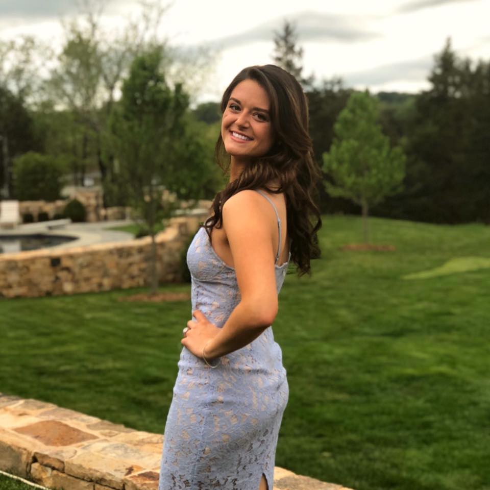 Morgan Bettinger is pictured in a blue dress.