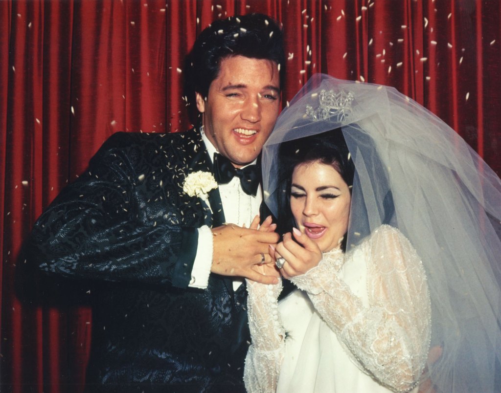 Photo of Priscilla Presley and Elvis at their wedding. 