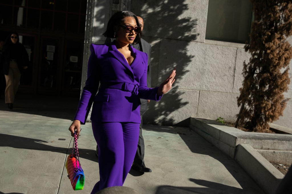 LOS ANGELES, CA - DECEMBER 13: Megan Thee Stallion makes her way from the Hall of Justice to the courthouse to testify in the trial of Tory Lanez on Dec. 13, 2022 in Los Angeles.