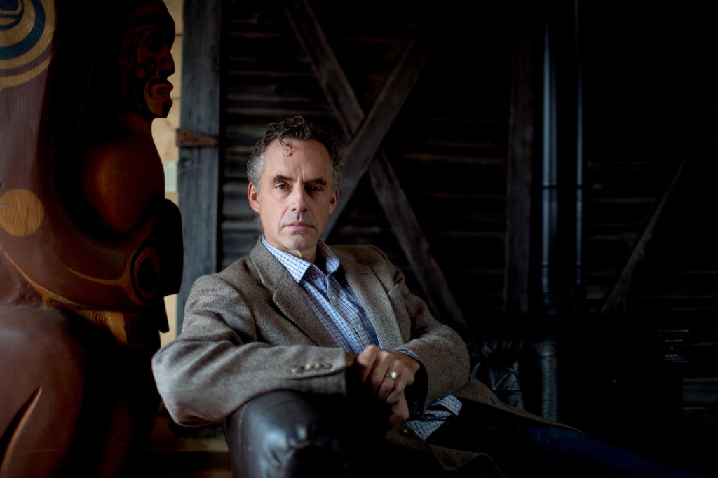 Dramatically lit portrait of Jordan Peterson. 