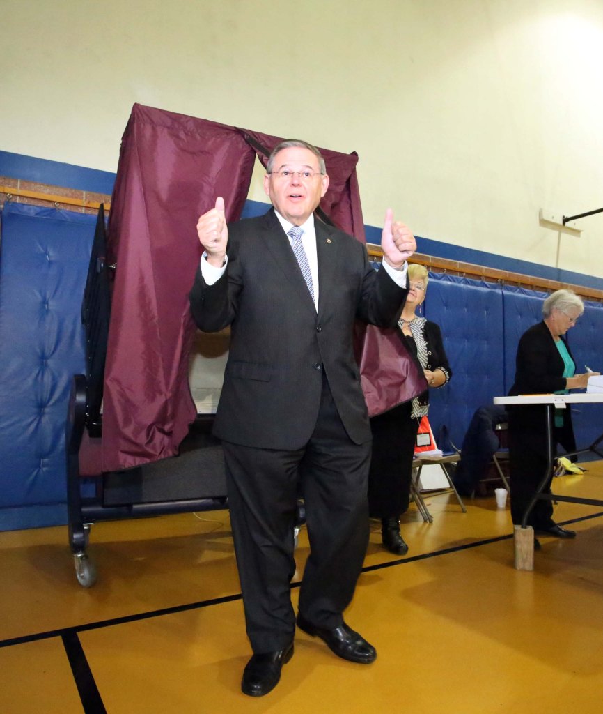 Sen. Bob Menendez gives a thumbs up as he votes in 2018.