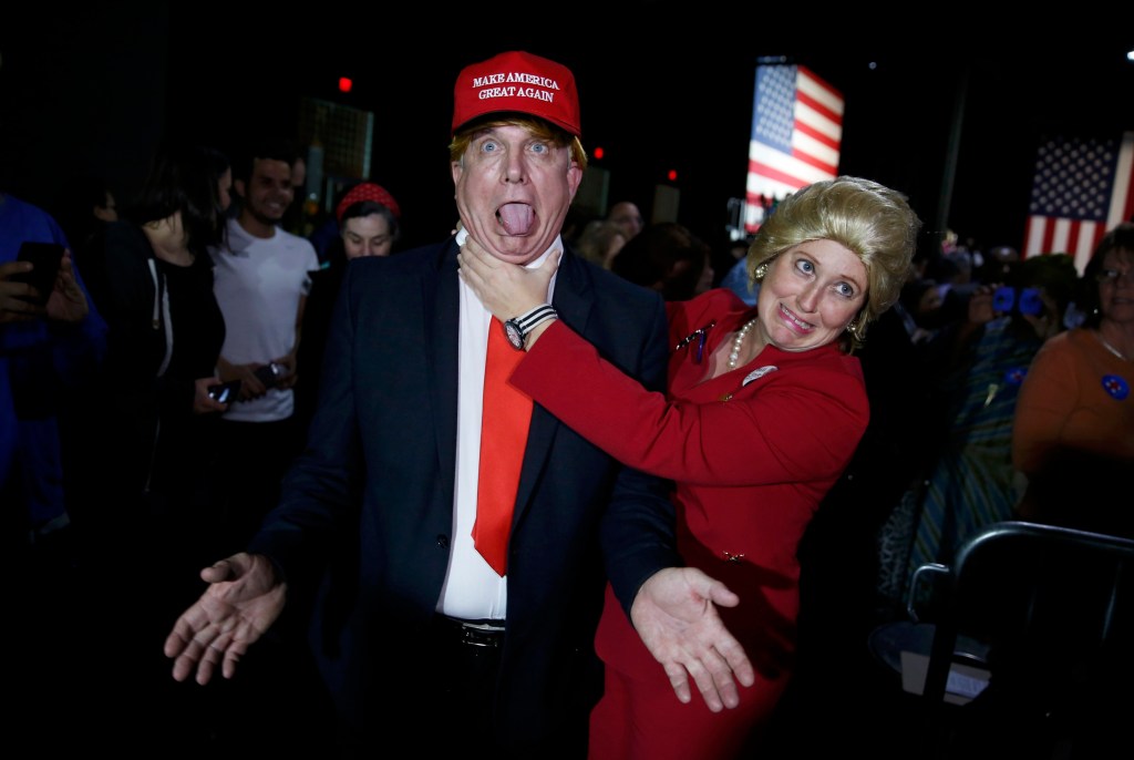Supporters of Hilary Clinton dress up as her and 2016 rival Donald Trump.
