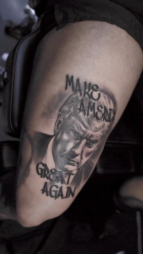 Rapper Badman Kevo put Trump's mugshot on his leg in homage.