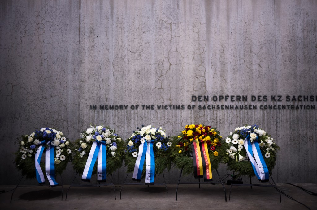 Wreaths at the memorial wall of the Nazi concentration camp Sachsenhausen.