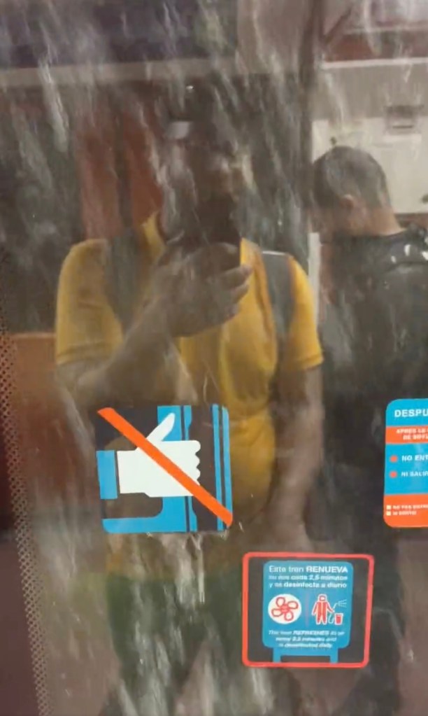 One commuter took a picture through the reflective window to show the harsh downpour.
