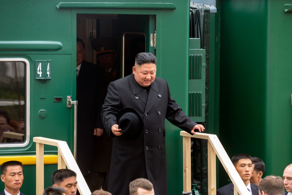 Kim Jong Un disembarking from train