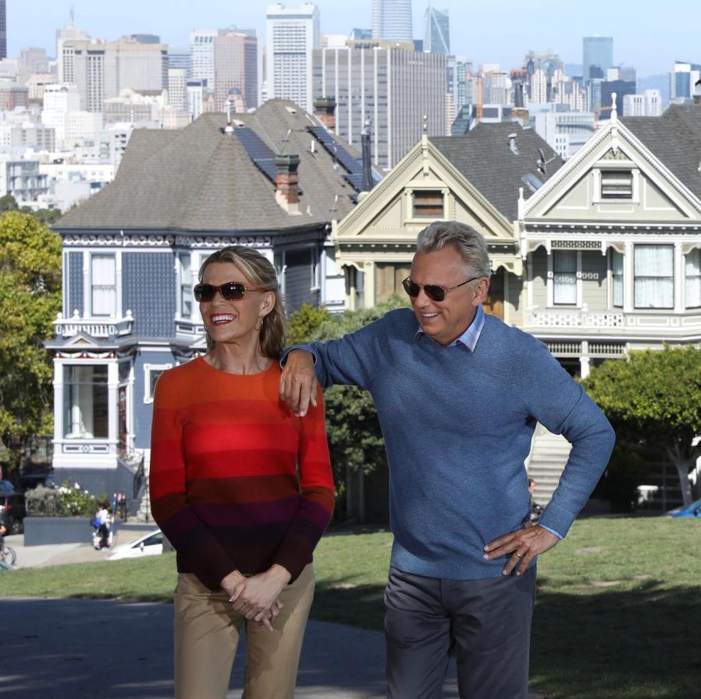 Photo of Vanna White and Pat Sajak with his arm on her shoulder in San Fransisco. 
