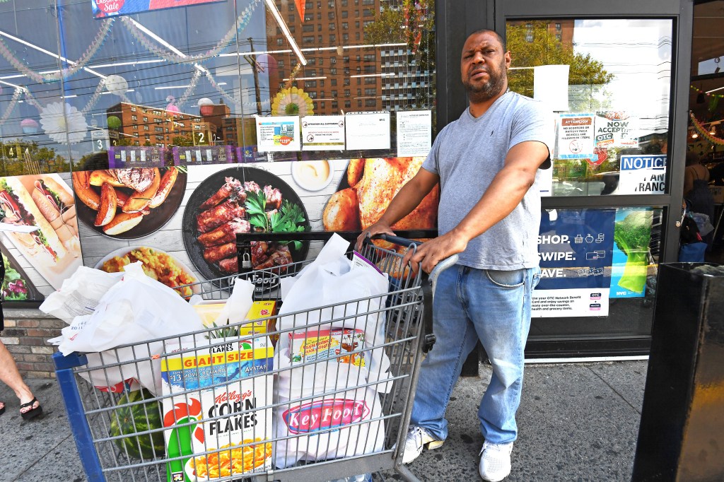 A photo of Sergio Acevedo with his grocery cart.