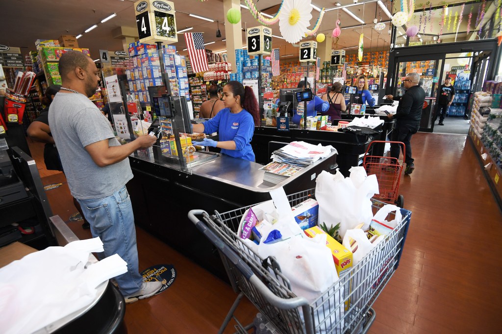 The scene at a check out at a Key Food branch in the Bronx.