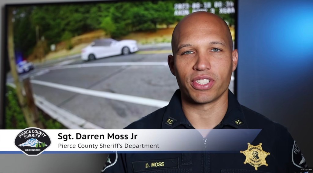 Sgt. Darren Moss Jr. is pictured speaking about the incident.