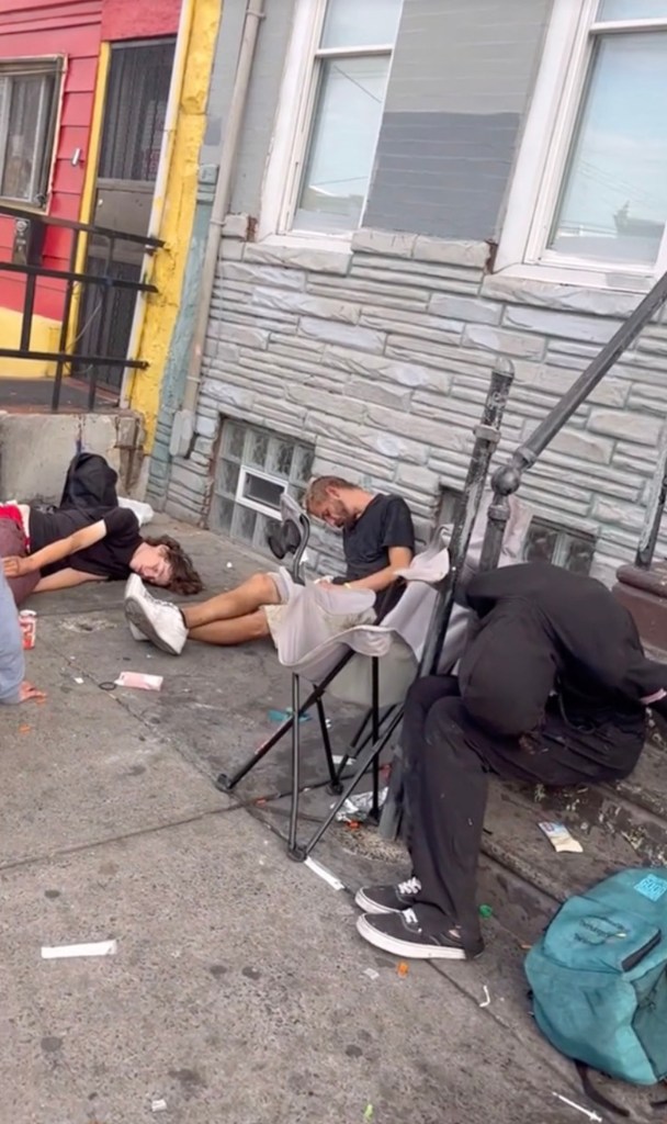 People are seen passed out or hunched over on Kensington's trash-littered stoops and streets