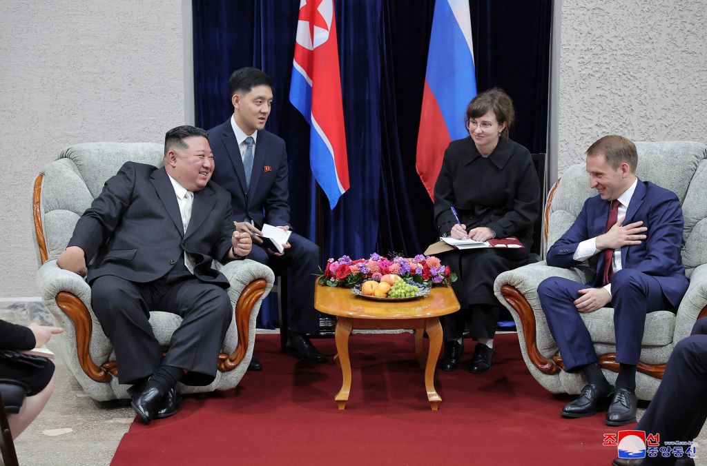 Kim Jong Un meets with Russia's minister of Natural Resources and Ecology Alexander Kozlov at the Khasan Railway station before the North Korean leader's visit Putin.